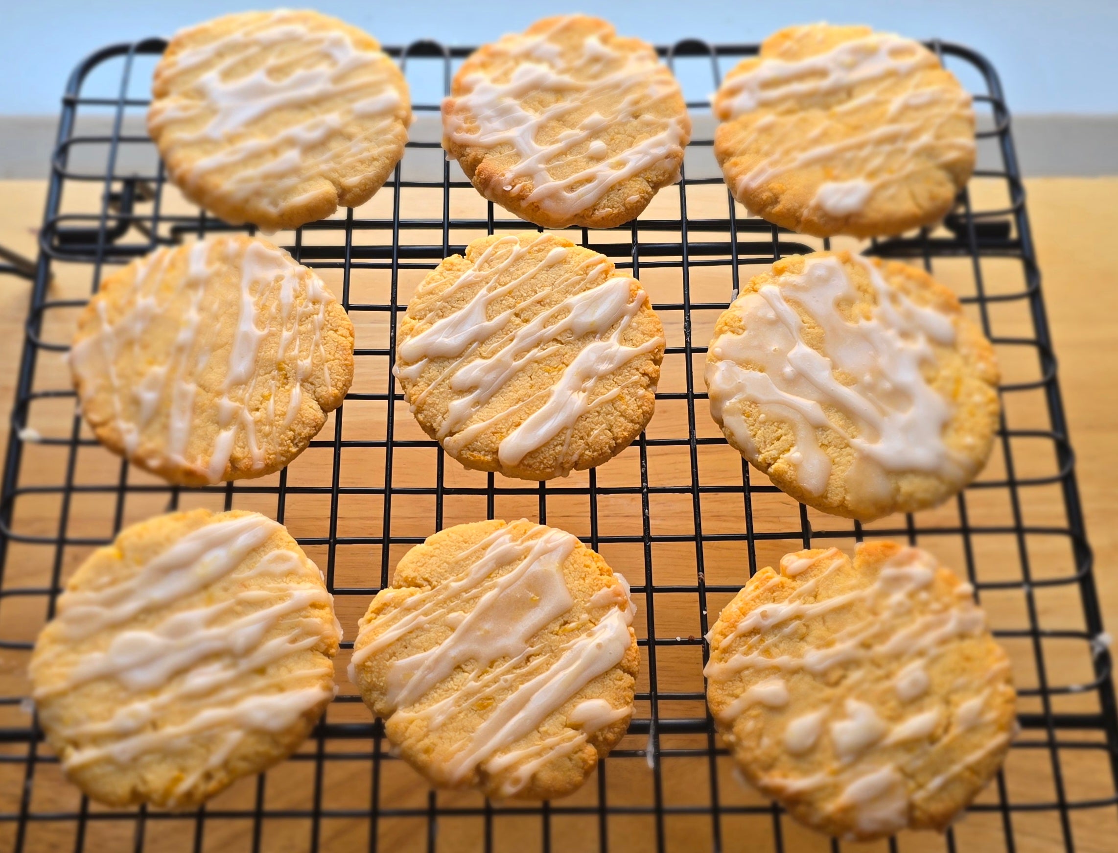 Lemon Cookies with lemon glaze on a cooling rack