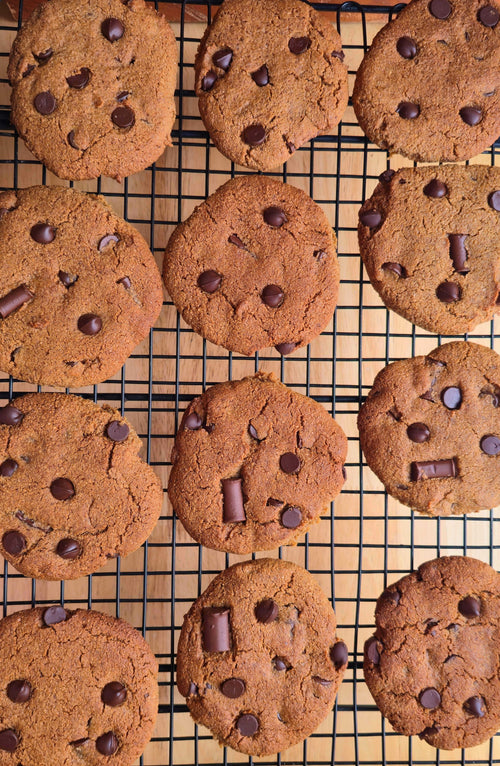 Chocolate chip cookies on a cooling rack
